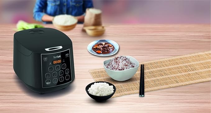 Tefal Easy Rice Plus RK736B หม้อหุงข้าวอัจฉริยะ 1.8 ลิตร – Fuzzy Logic, หม้อทรงกลม, 11 โปรแกรมTefal Easy Rice Plus RK736B Smart Rice Cooker 1.8L – Fuzzy Logic, Spherical Pot & 11 Cooking Programs